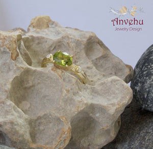 Oval Peridot 7x5 Gold Ring with side diamonds